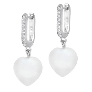 A pair of silver hoop earrings featuring a line of small crystals and a dangling heart-shaped white shell pearl. The hoops are marked with \“925,\“ indicating sterling silver.
