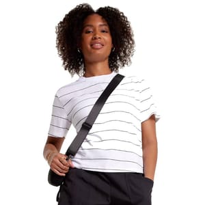 White short-sleeve T-shirt with thin black horizontal stripes, paired with a black crossbody strap.