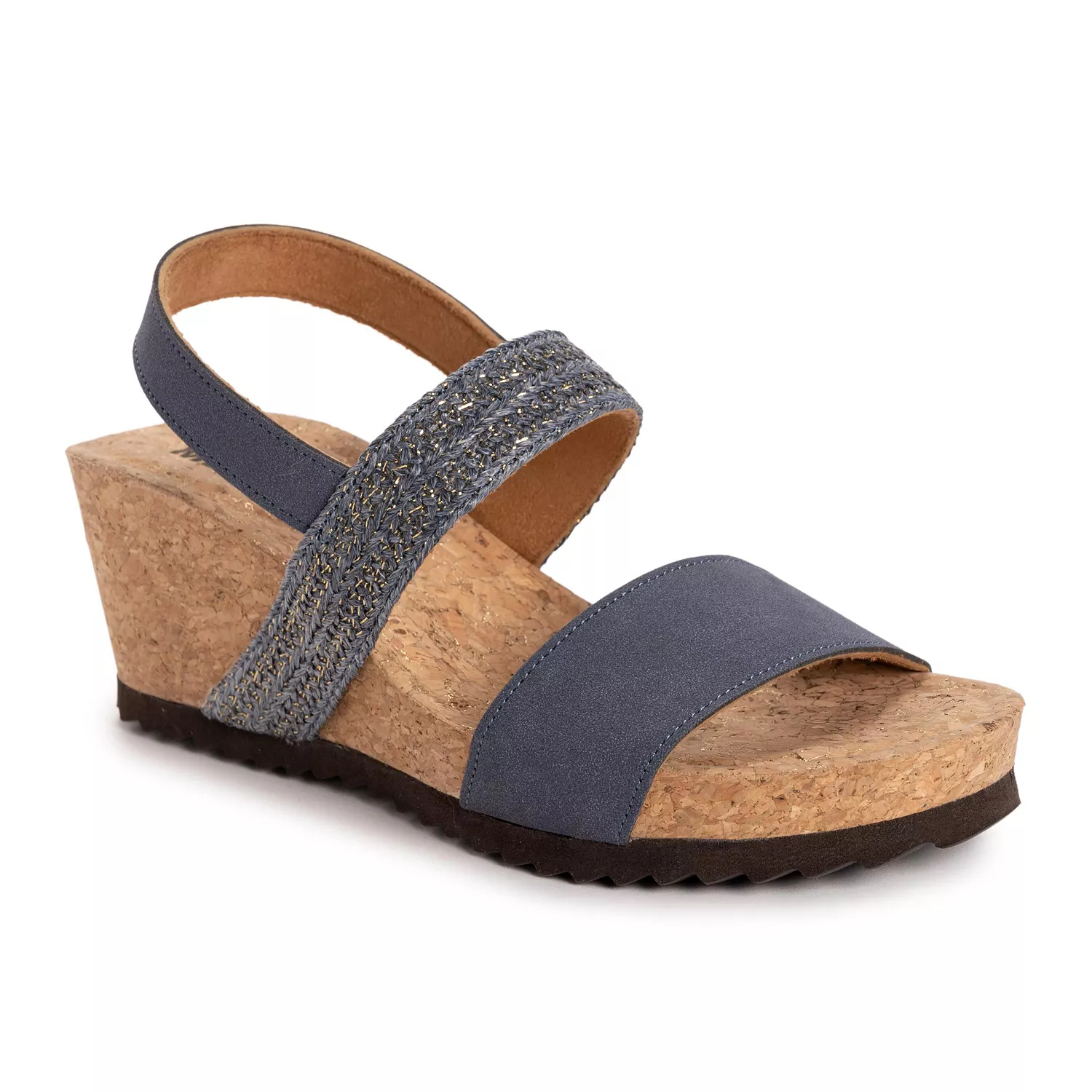 A wedge sandal with a cork sole, featuring a dark blue upper and an elastic strap with woven detailing.