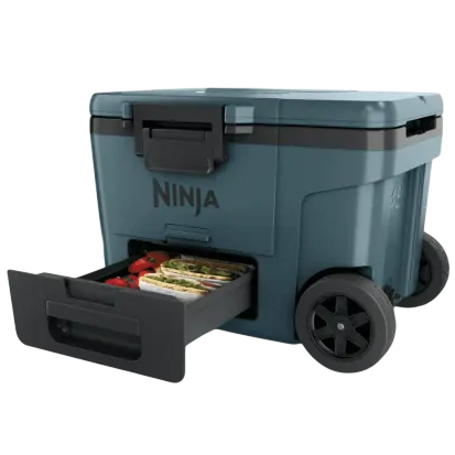 A Ninja outdoor cooler with wheels, featuring a side drawer for storing items.