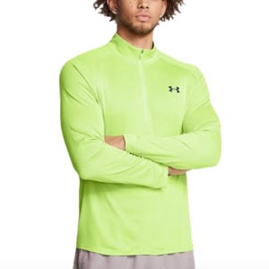 A neon green Under Armour textured pullover featuring long sleeves and a quarter-zip design, with the Under Armour logo on the chest.