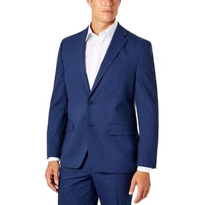 A man is wearing a blue suit with a subtle check pattern, paired with a white dress shirt. The suit jacket has a tailored fit, with notch lapels and flap pockets.