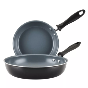 The Farberware Nonstick Skillet Set includes two black frying pans with gray nonstick interiors and black handles. They feature riveted connections for durability.