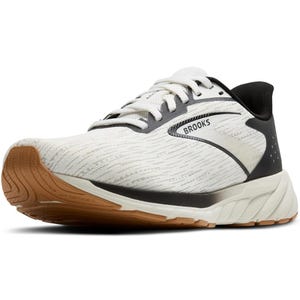 Brooks Anthem 7 Running Shoes feature a sleek design with a cream-white upper, black details, and a brown rubber sole for traction. They offer lightweight support and cushioning ideal for runners.