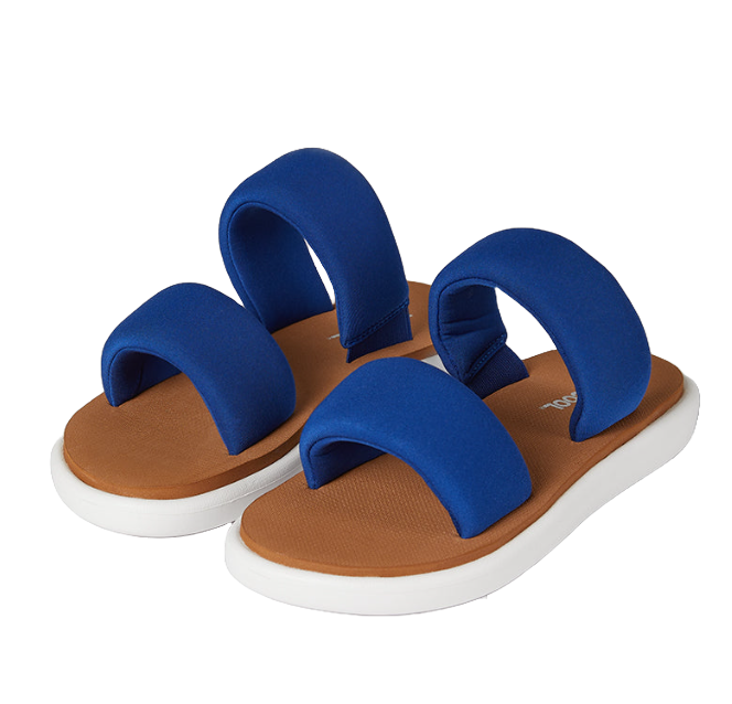 32 Degrees Sandals feature a brown footbed, plush blue straps, and a white sole, designed for comfort and style.