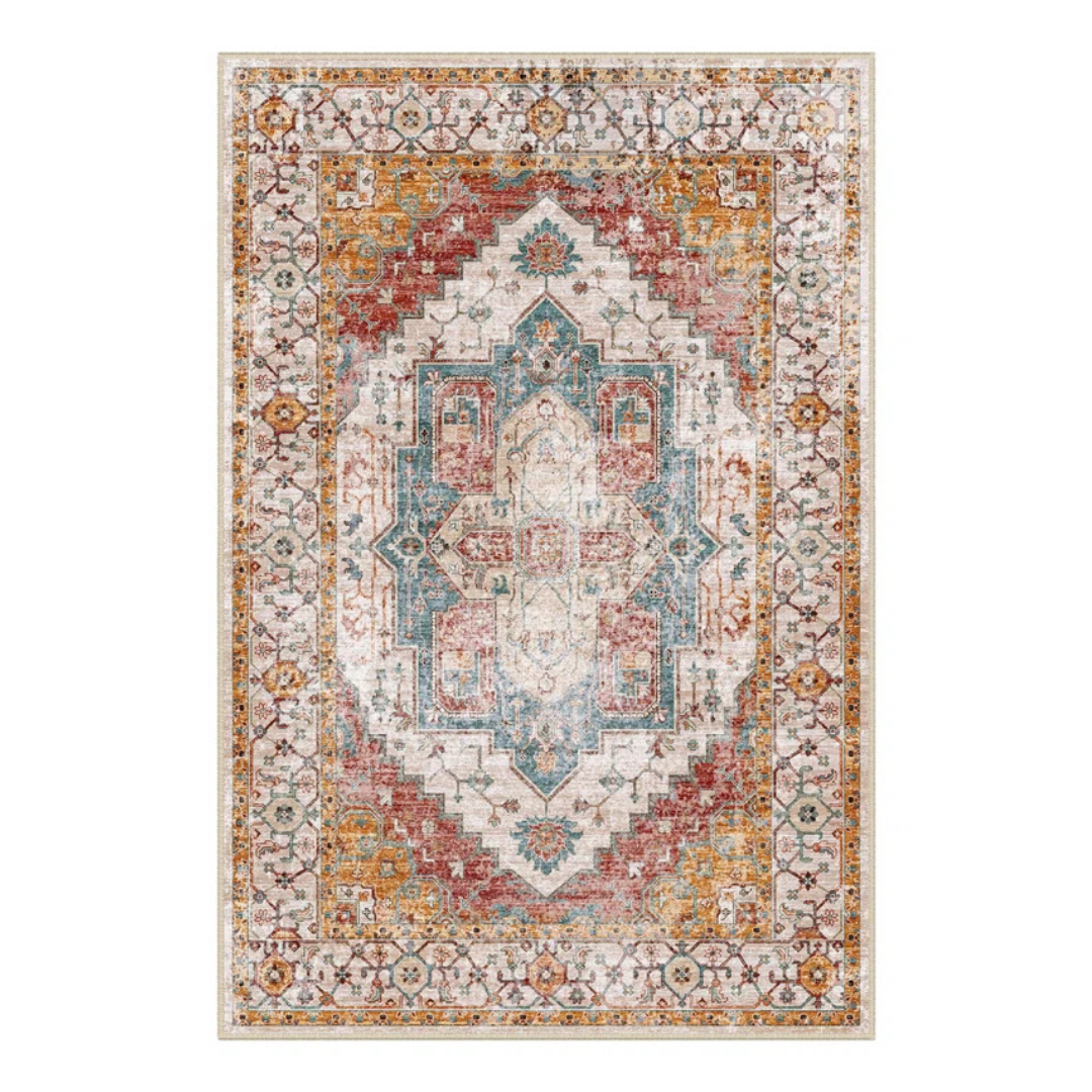 A rectangular, Persian-style area rug features an intricate geometric and floral pattern in colors including red, blue, and gold, with a white background.