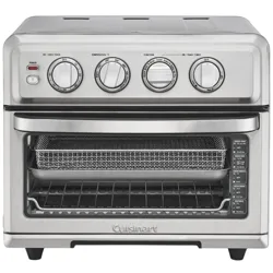 A Cuisinart stainless steel toaster oven with dials for power, temperature, function, and a timer, featuring a mesh basket and wire rack inside.