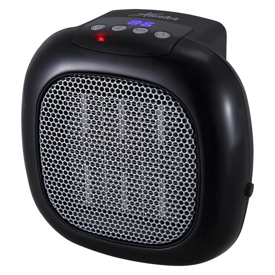 This is a compact, black portable heater with a honeycomb grill front and a digital control panel on the top with indicator lights.