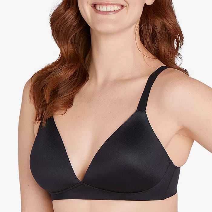 A woman is wearing a black V-neck bra.