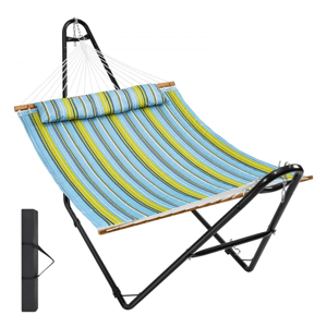 A blue and green striped hammock with a black metal stand and a headrest pillow, accompanied by a black carrying bag.