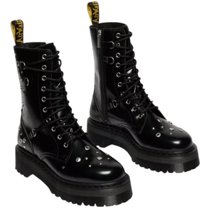 Black lace-up combat boots with silver studs, thick soles, and a zipper on the side. Featuring a branded pull tab at the back.