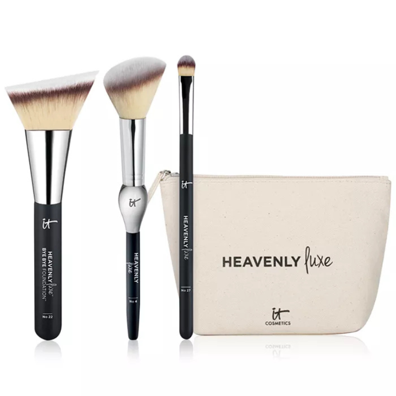 The image shows a 4-piece set of IT Cosmetics Heavenly Luxe brushes, including a flat-top foundation brush, a blush brush, and an eyeshadow brush, along with a makeup bag.