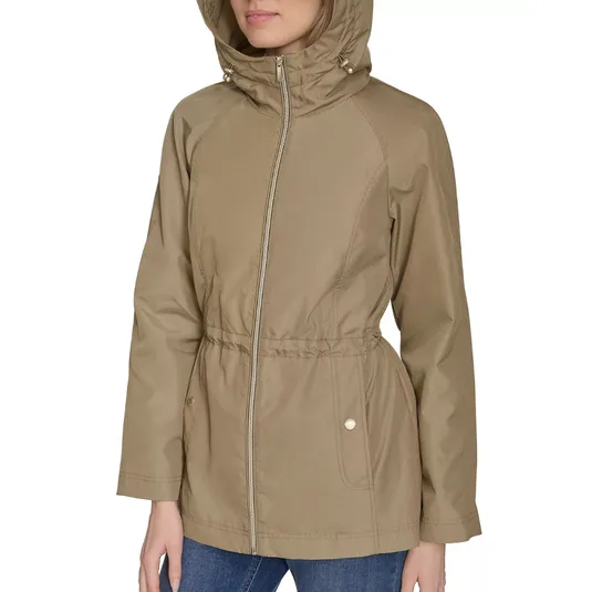 Beige hooded jacket with a front zipper, drawstring waist, and two front pockets, worn over blue jeans.