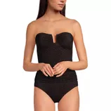 A strapless, textured black bodysuit with a subtle leopard print pattern. It features a unique notched neckline and ruched detailing at the waist.