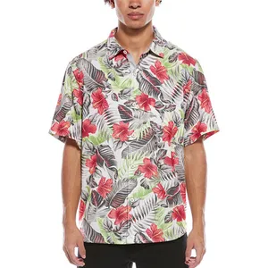 A short-sleeve Hawaiian shirt featuring a tropical floral pattern with red flowers and green leaves.