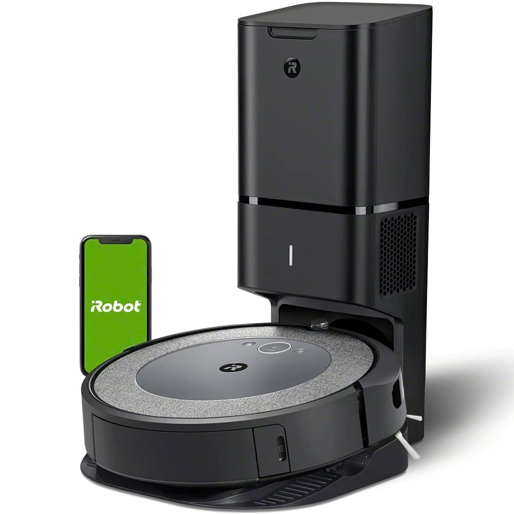 A robotic vacuum cleaner with its charging and self-emptying base alongside a smartphone displaying the iRobot logo.