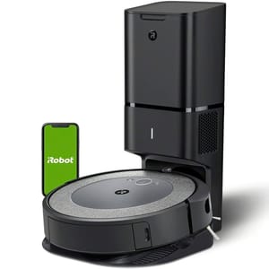 A robotic vacuum cleaner with its charging and self-emptying base alongside a smartphone displaying the iRobot logo.