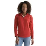 A person wearing a red quarter-zip long-sleeve sweater and blue jeans stands against a plain background.