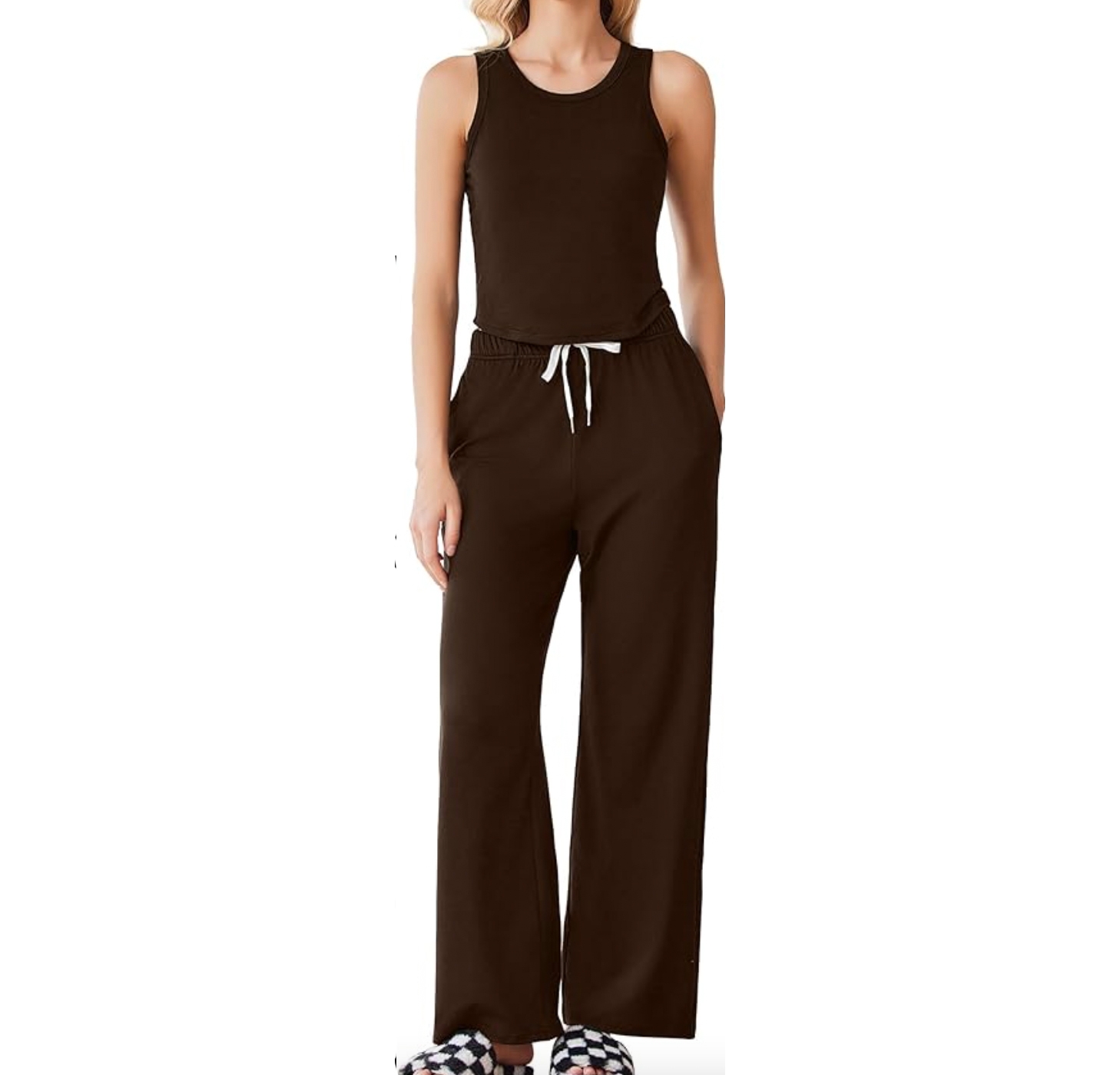 A women's 2-piece loungewear set featuring a sleeveless brown tank top and matching wide-leg pants with an elastic waistband and white drawstring. Paired with checkered slippers.