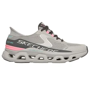A gray Skechers Slip-Ins Glide-Step shoe with a breathable mesh upper, featuring pink and teal accents. The shoe has a distinctive open cellular outsole design.