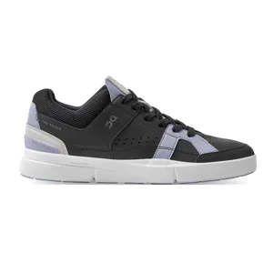 Black and purple sneaker with a white sole, featuring the words \“THE ROGER,\“ \“SWISS ENGINEERING,\“ and \“CLOUDTEC\“ on the side.