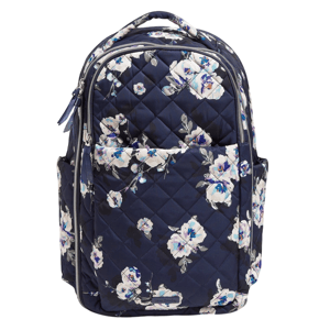 A navy floral quilted backpack featuring multiple compartments, side pockets, and zipper closures.