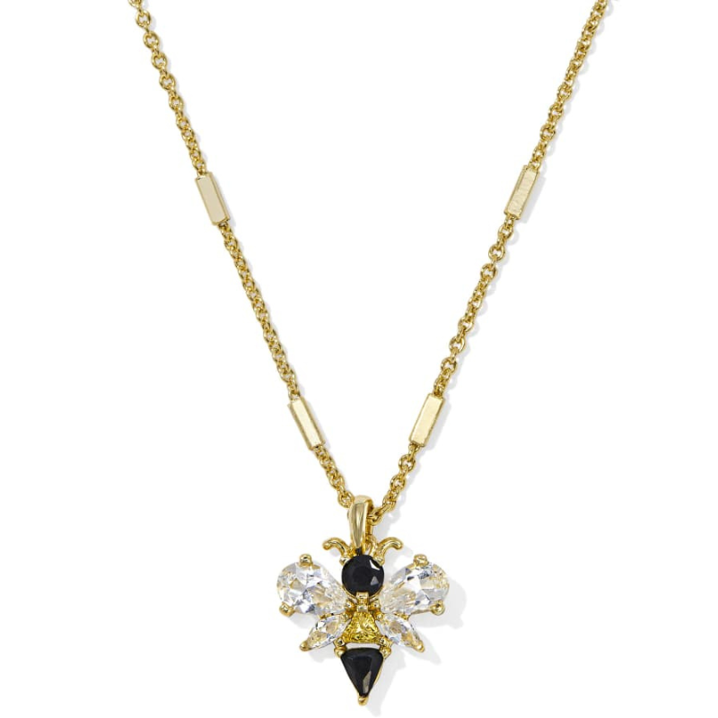 Gold chain necklace with a bee-shaped pendant featuring black and clear crystals, arranged in a symmetrical design to form the bee's wings, body, and head.