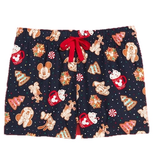 Black shorts with a festive holiday pattern featuring cartoon characters, gingerbread cookies, Christmas trees, and peppermint candies, and a red drawstring.