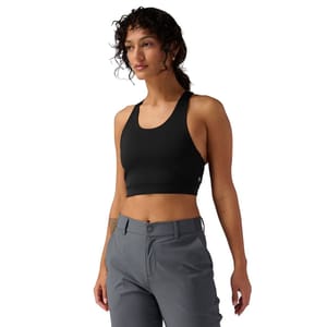 The Backcountry Racerback Bra is a black, sleeveless sports bra with a racerback design. It offers a snug fit and pairs with gray pants for a versatile, athletic look.