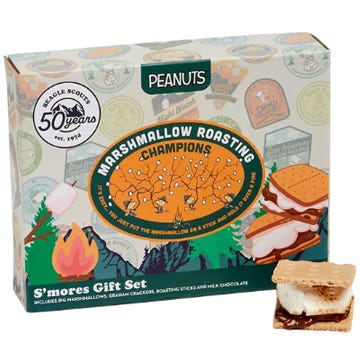 S'mores Gift Set featuring marshmallows, graham crackers, roasting sticks, and milk chocolate, themed with Peanuts and celebrating 50 years of Beagle Scouts.