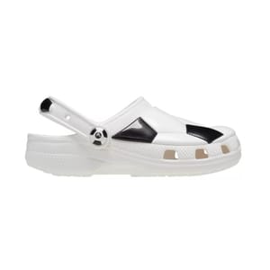 White slip-on shoe with black geometric accents, featuring a perforated upper and a heel strap typically associated with Crocs.
