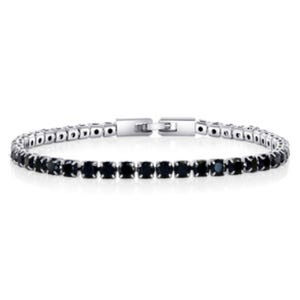 Silver tennis bracelet featuring a row of round black stones with a box clasp closure.