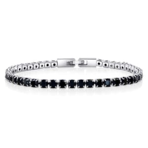 Silver tennis bracelet featuring a row of round black stones with a box clasp closure.