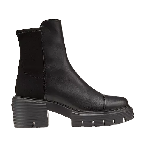 Black leather ankle boot with a chunky ridged sole and a stretch panel on the side.