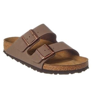 A pair of brown nubuck Birkenstock Arizona sandals featuring two adjustable straps with metal buckles and a contoured cork footbed.