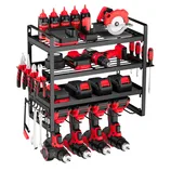 A black and red tool organizer holds power tools, screwdrivers, pliers, wrenches, drill batteries, and oil bottles on multiple shelves, including slots for drills and a space for a circular saw.
