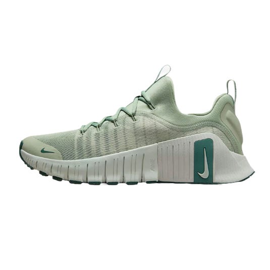 Nike athletic shoe in a light green colorway with a textured upper, featuring a white sole and a teal Nike logo on the side.