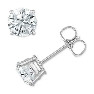 Round-cut diamond studs set in white metal with four-prong settings, featuring a butterfly back.