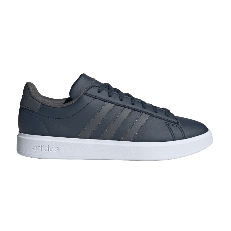 A dark gray Adidas sneaker with signature three stripes and a white sole.