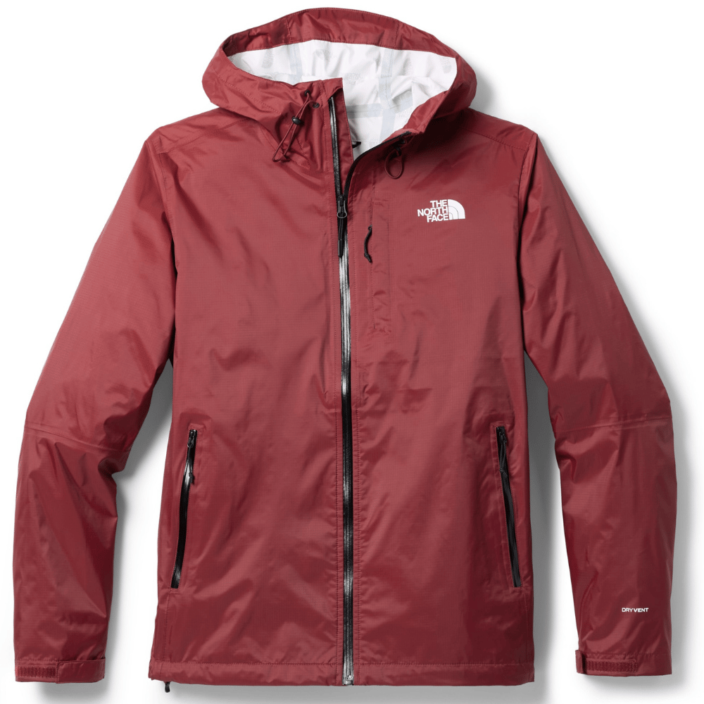 A red North Face jacket with a hood and full zip closure, featuring the logo on the chest and \“Dryvent\“ on the sleeve.