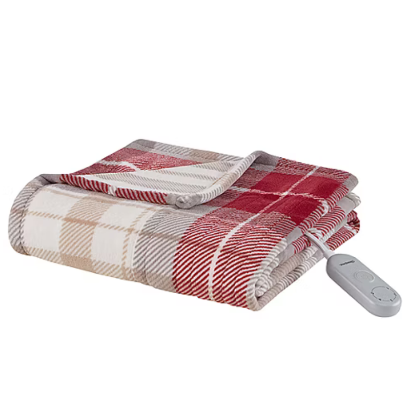 Checkered heated blanket with a red, beige, and white pattern, featuring a remote control.
