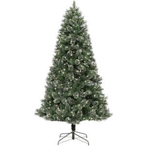 A pre-lit artificial Christmas tree with a metal stand, featuring green branches dusted with snow and integrated warm white lights.
