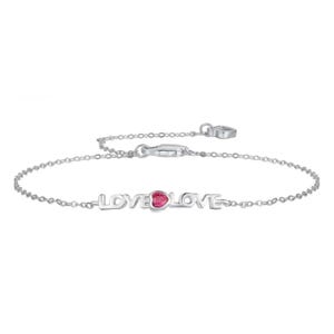 A delicate silver chain bracelet features the word \“LOVE\“ repeated twice, with a small pink heart-shaped gemstone in the center. It includes a lobster claw clasp for fastening.