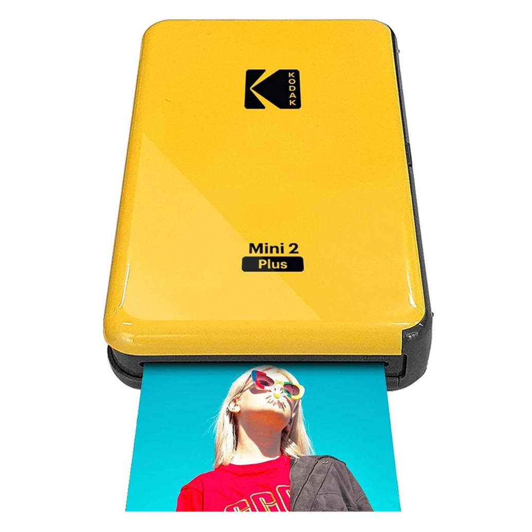 A Kodak Mini 2 Plus Portable Photo Printer in yellow, designed for on-the-go printing, with a photo emerging from the slot.