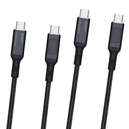 A set of black Aukey USB-C cables, featuring an LED display for charging status and a braided design for durability.