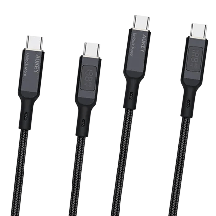 A set of black Aukey USB-C cables, featuring an LED display for charging status and a braided design for durability.