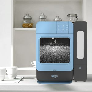 A countertop ice maker with a visible ice compartment, alongside a water dispenser.