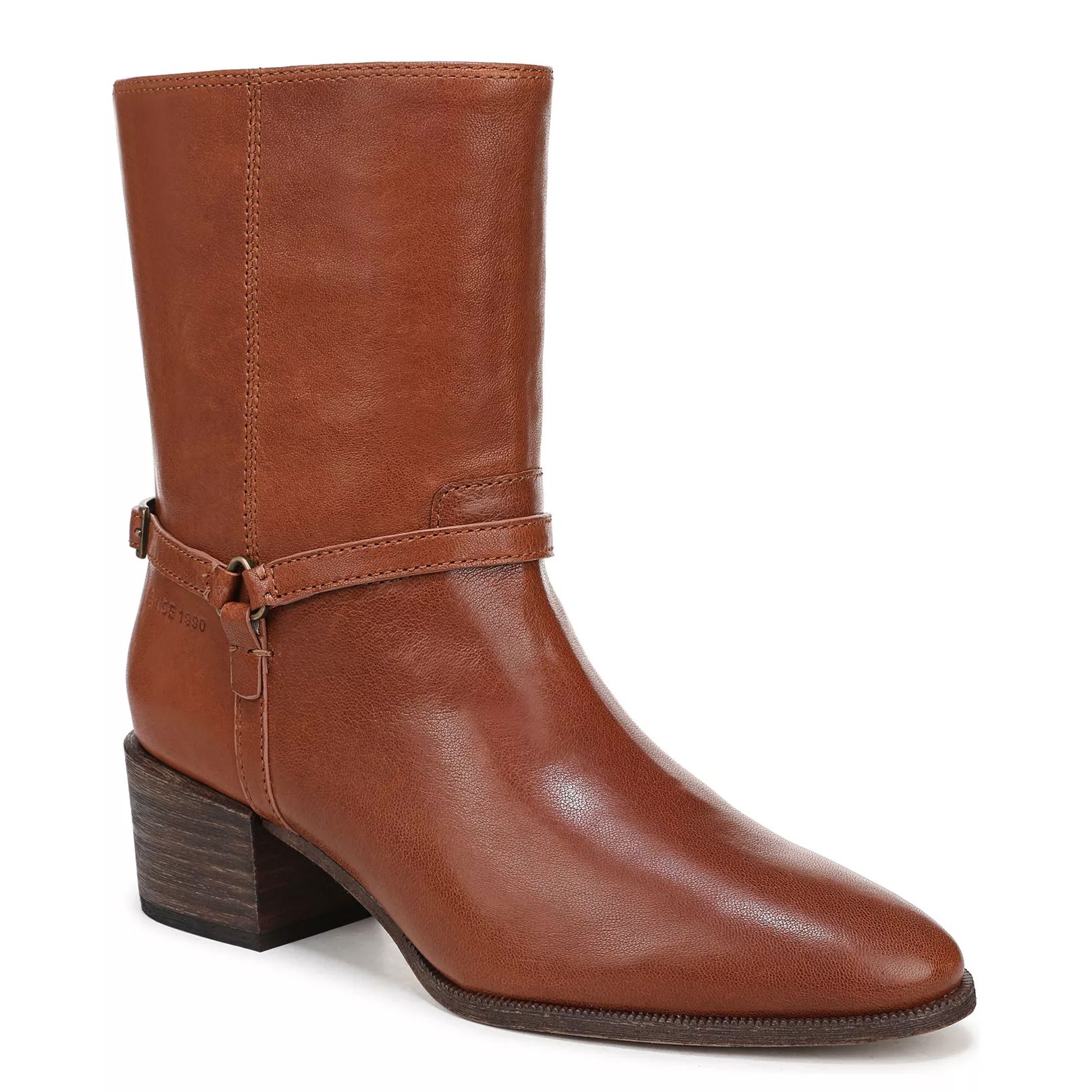 Brown leather ankle boot with a low block heel, featuring a subtle strap and buckle detail near the ankle.
