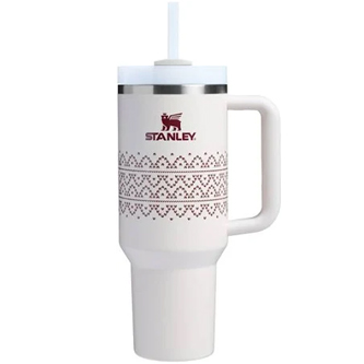 A white Stanley 40oz tumbler with a handle, featuring a decorative design and a straw. It has a stainless steel rim and the Stanley logo in red.