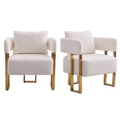 A pair of accent chairs with plush white teddy fleece upholstery and sleek gold-toned metal frames.
